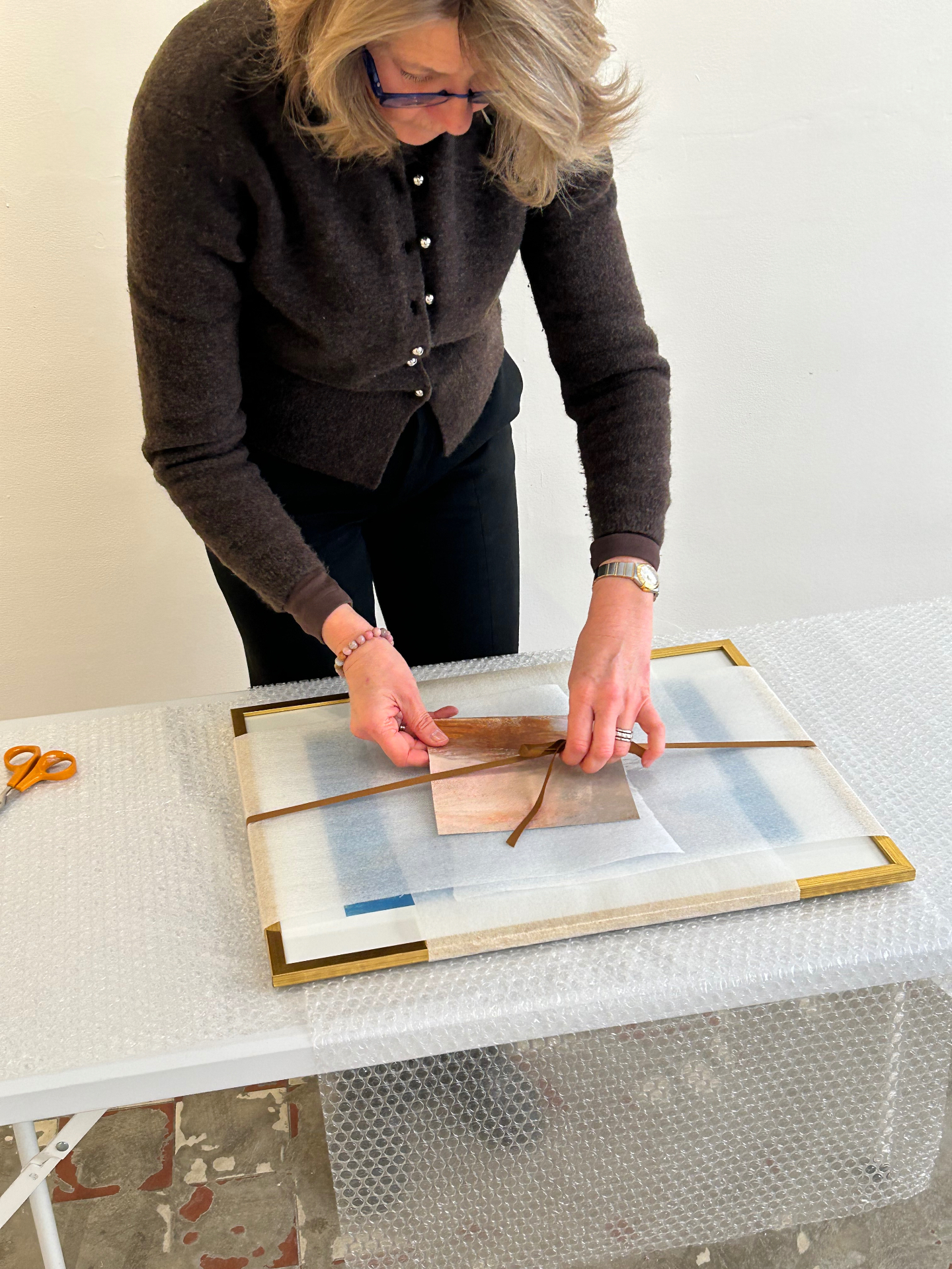 Portrait of the artist in her studio